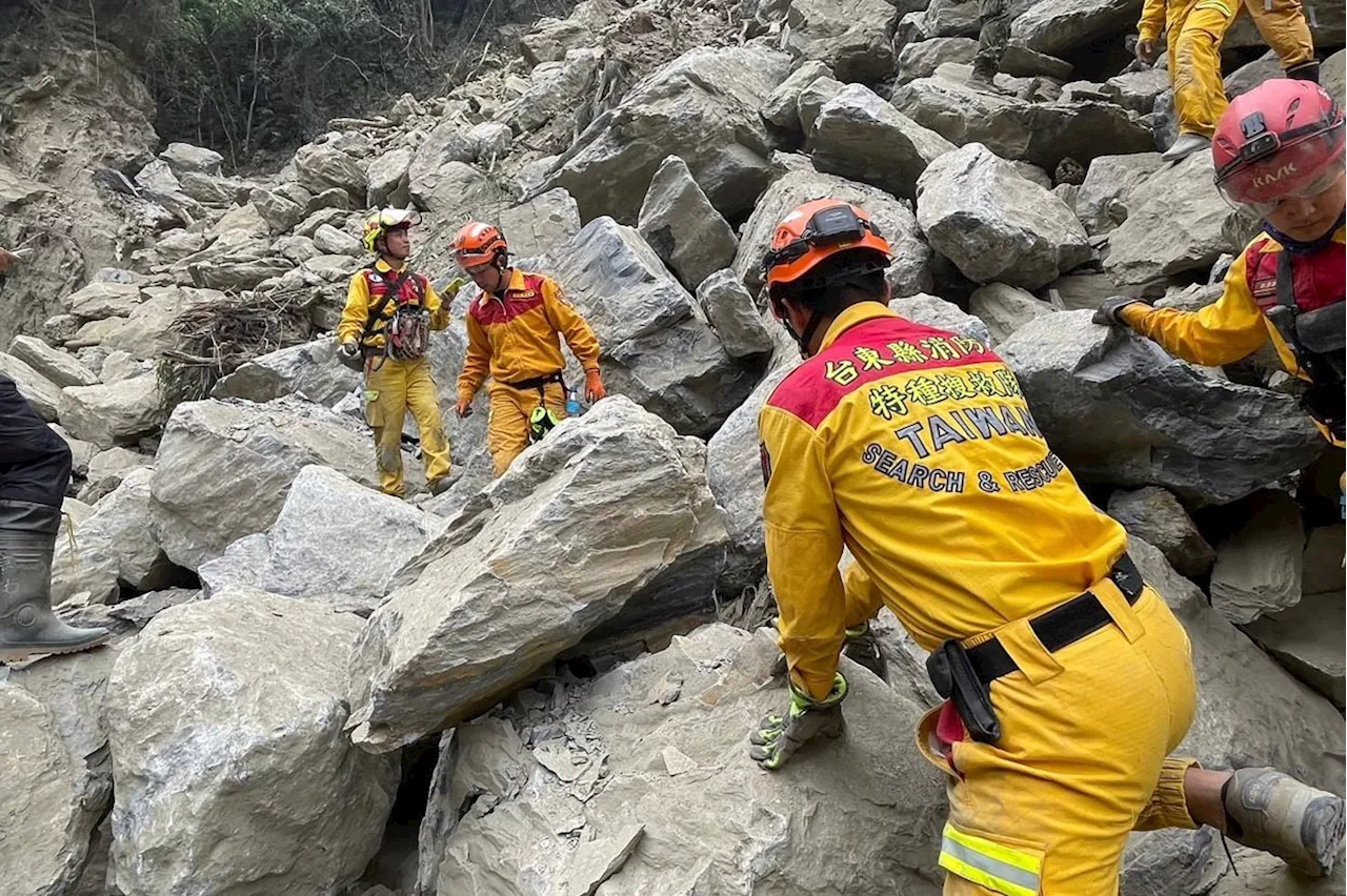 Taiwan rescuers free nine from cave after quake