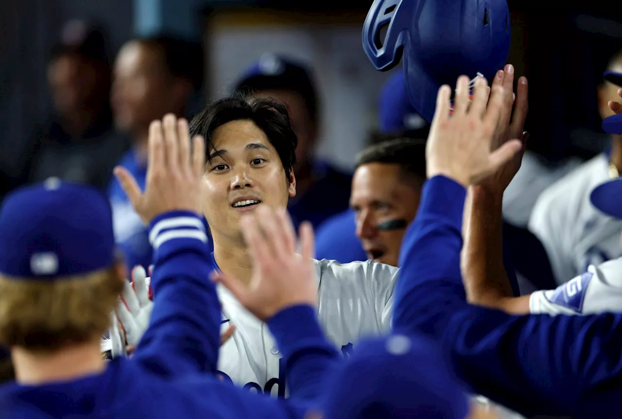 Dodgers make peace with fans who caught Shohei Ohtani ball, will review process