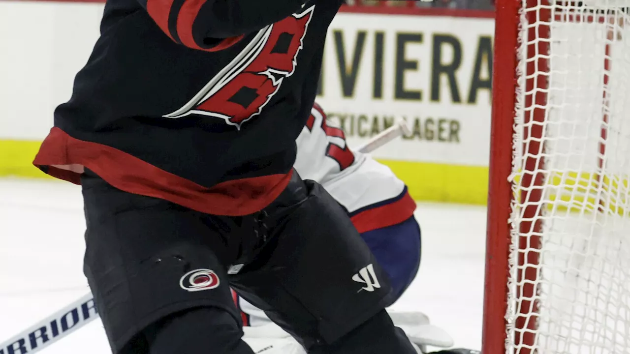 Hurricanes rally for 4-2 victory over slumping Caps. Ovechkin scores both goals for Washington.