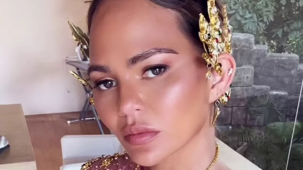 Chrissy Teigen wears traditional Thai clothes with kids Luna and Miles