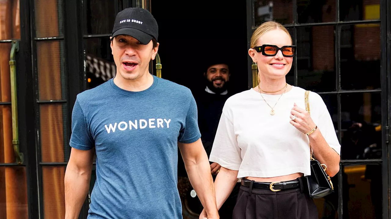 Kate Bosworth and husband Justin Long look loved-up as they sweetly hold hands while leaving their...