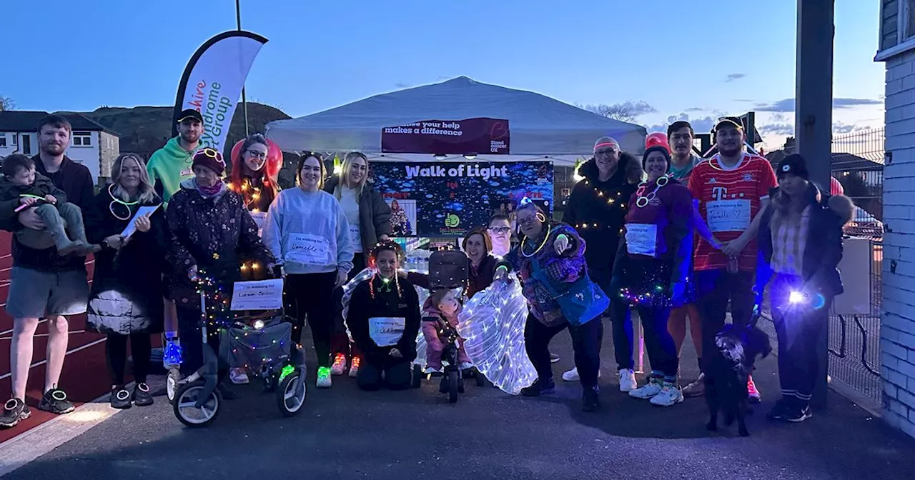 Walkers have raised more than £1,000 in memory of four-year-old Tommy Squibbs