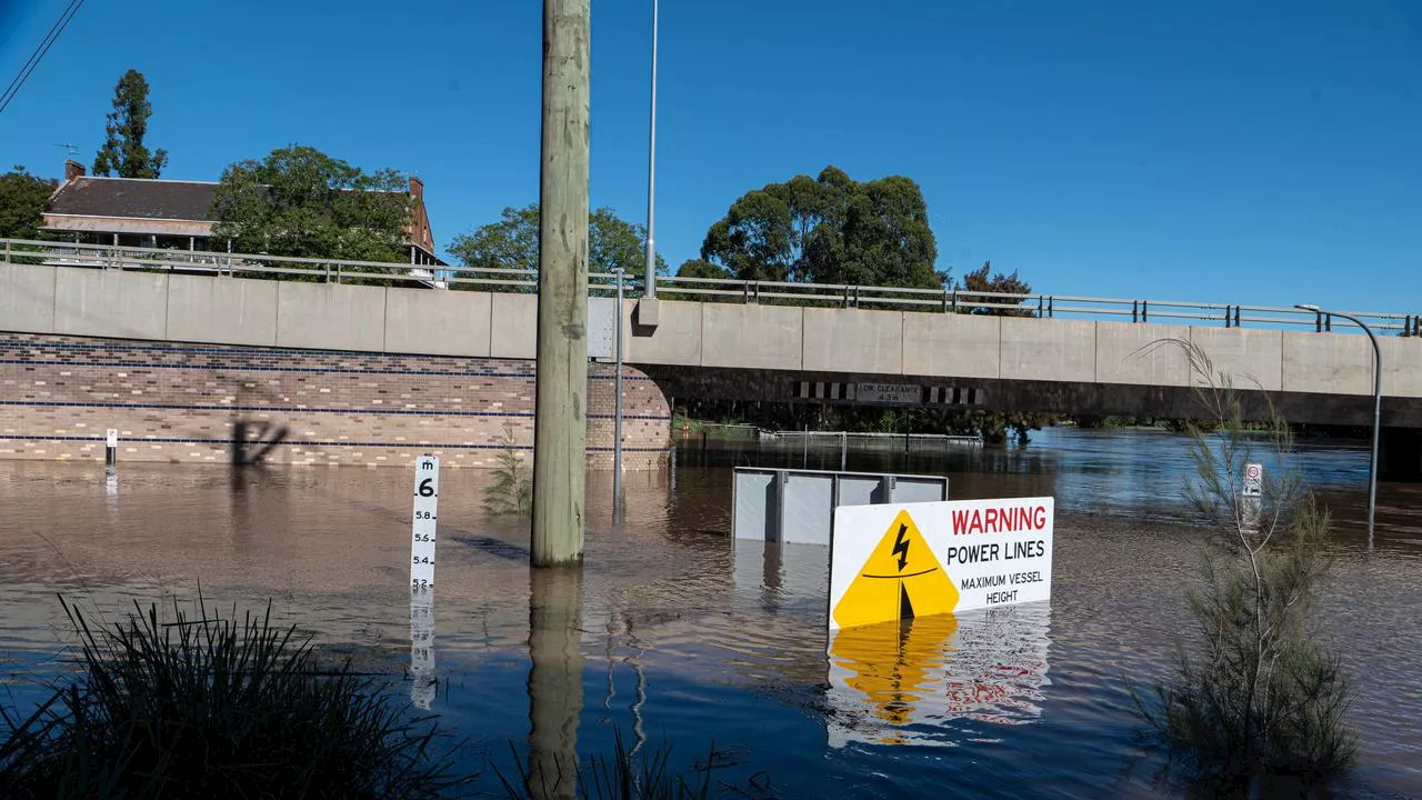 Flood threats continue as rain eases