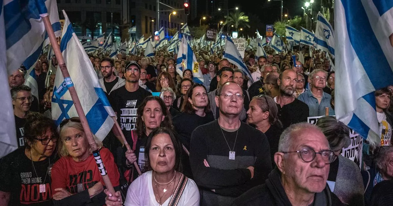 Relatives of Israeli hostages hold vigil on six-month anniversary of war