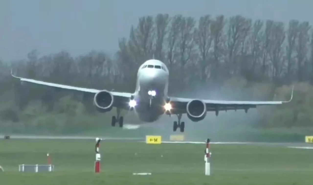 UK weather: Terrifying moment plane bounces off runway in 70mph gales as Storm Kathleen chaos grounds over...