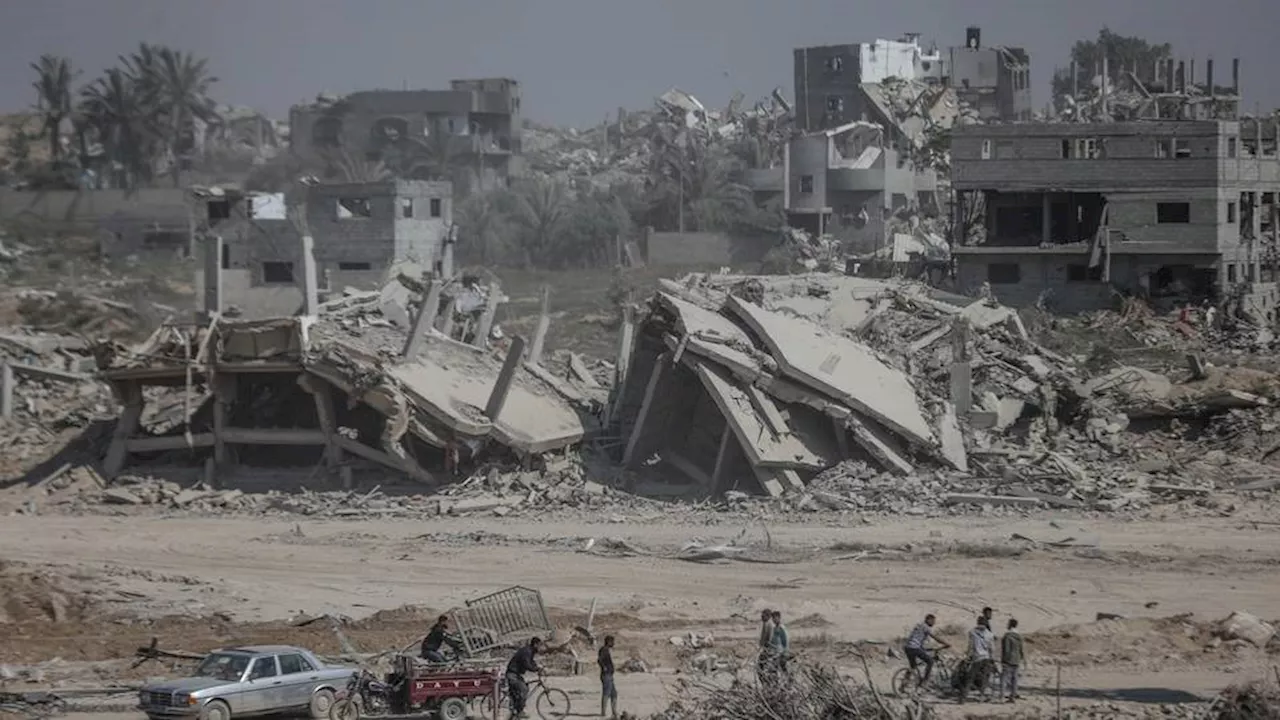 'Smells like death': Palestinians in Gaza return to devastated Khan Younis