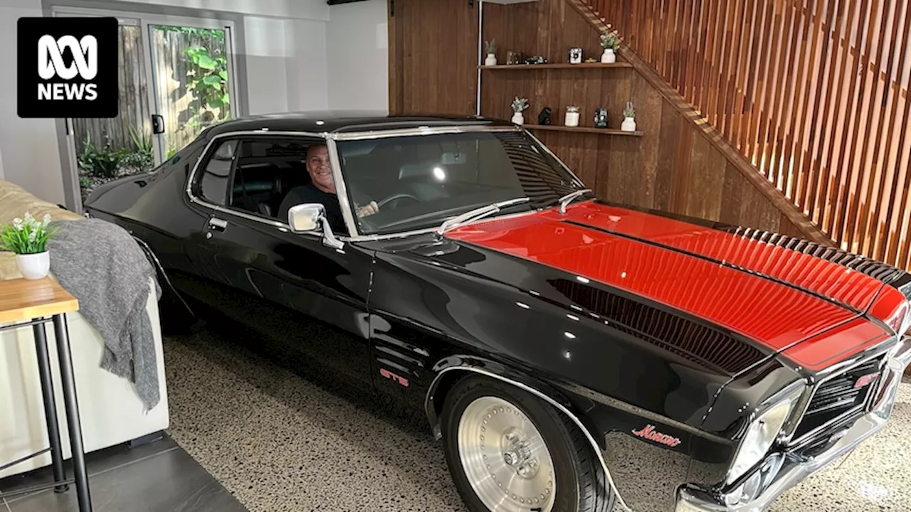 Queensland man renovates lounge room around classic Holden Monaro, fulfilling decades-long dream