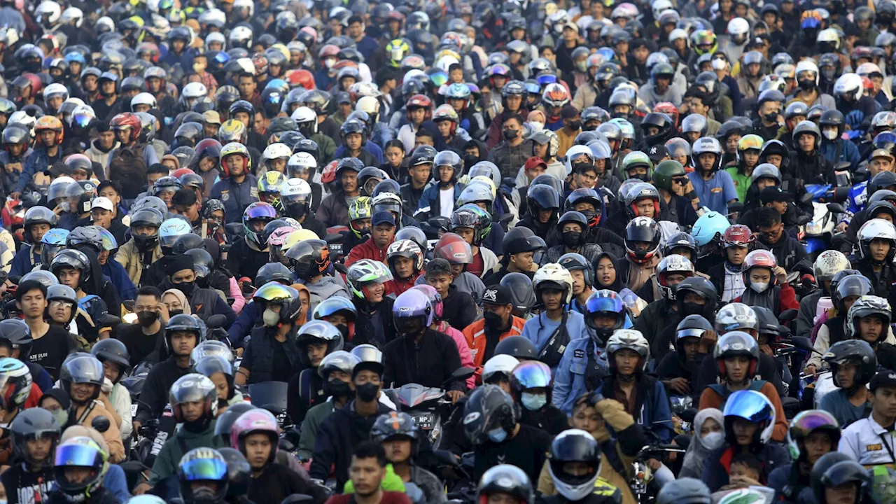 AP PHOTOS: Indonesia expects biggest-ever Eid homecoming, a mass movement of over 190 million people