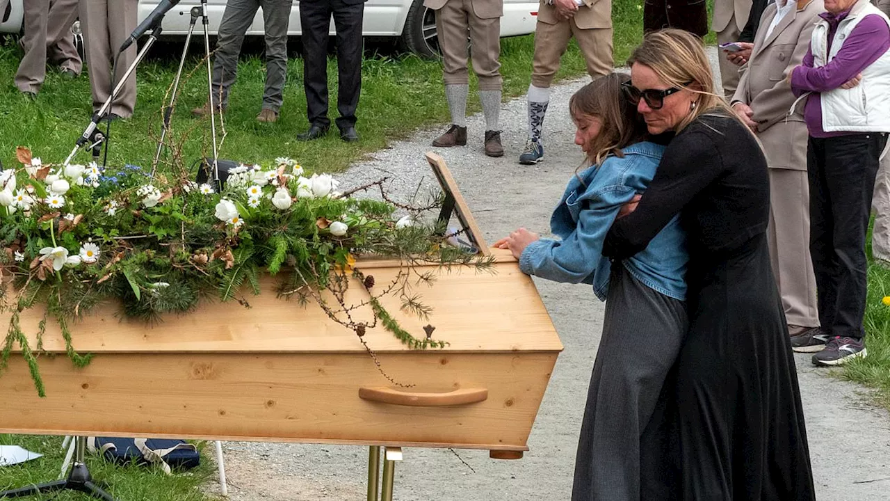 Widow of ski guide killed in helicopter crash pays tribute at emotional funeral