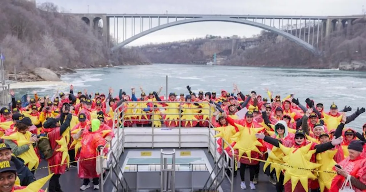 A bunch of people dressed up as the sun in Niagara Falls and broke a Guinness record