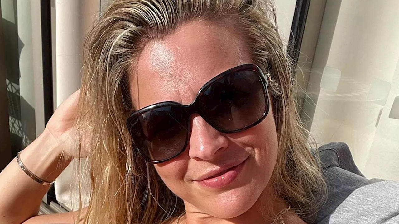 Gemma Atkinson is a bronzed goddess in sultry sheer top as she holidays with fiancé Gorka