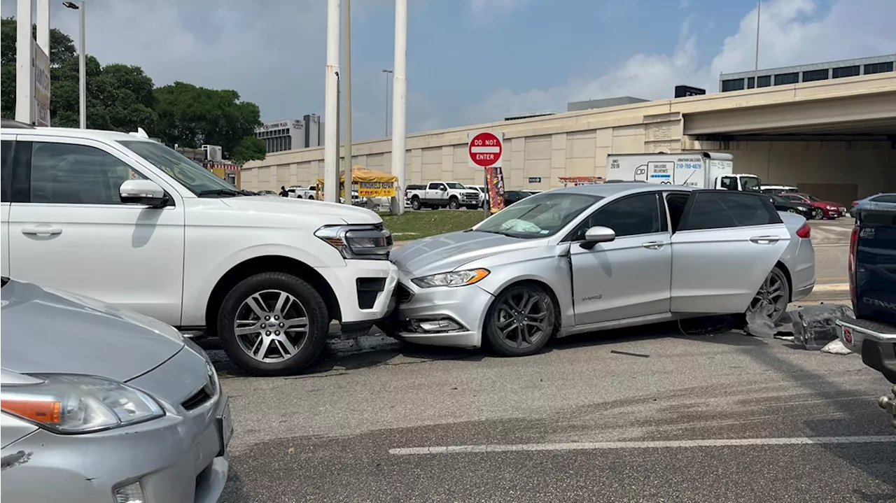 Two men arrested, one one the run after stolen car crashes into SUV on north side