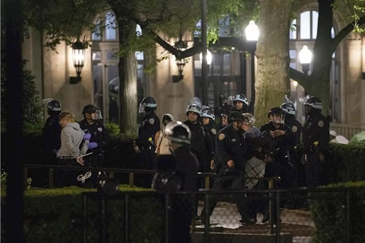 Protesters clash at UCLA after police clear pro-Palestinian demonstrators from Columbia University