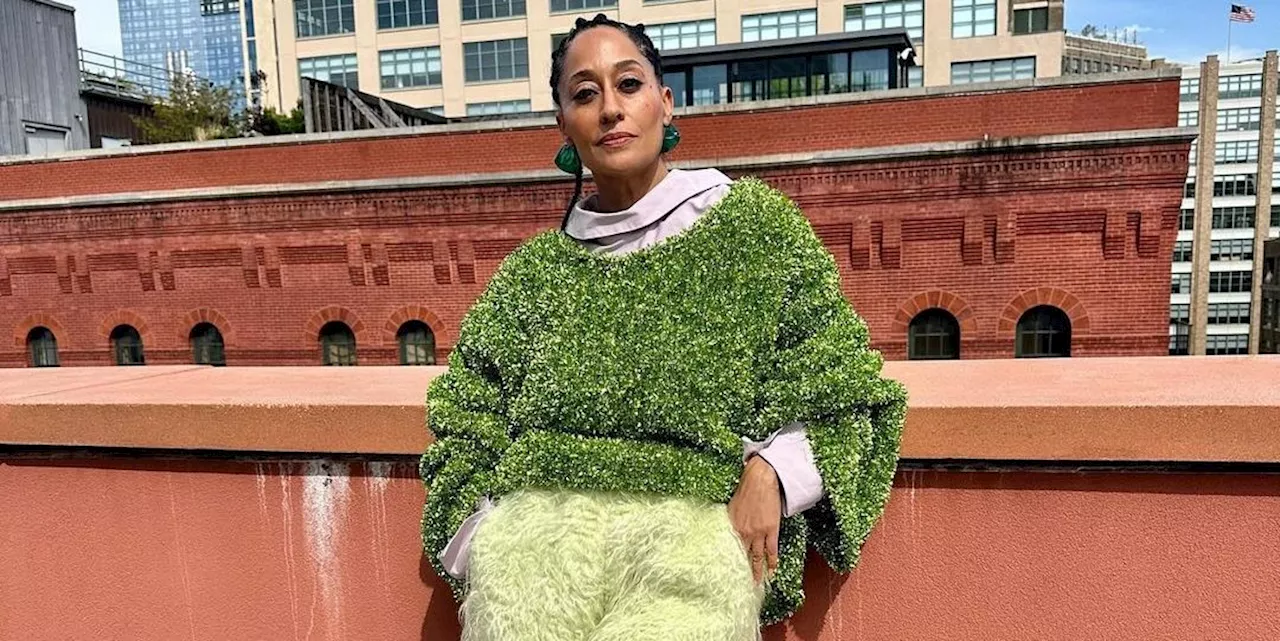 Tracee Ellis Ross Lets Loose in a Grassy Tinsel Sweater and Shaggy Yellow Shorts