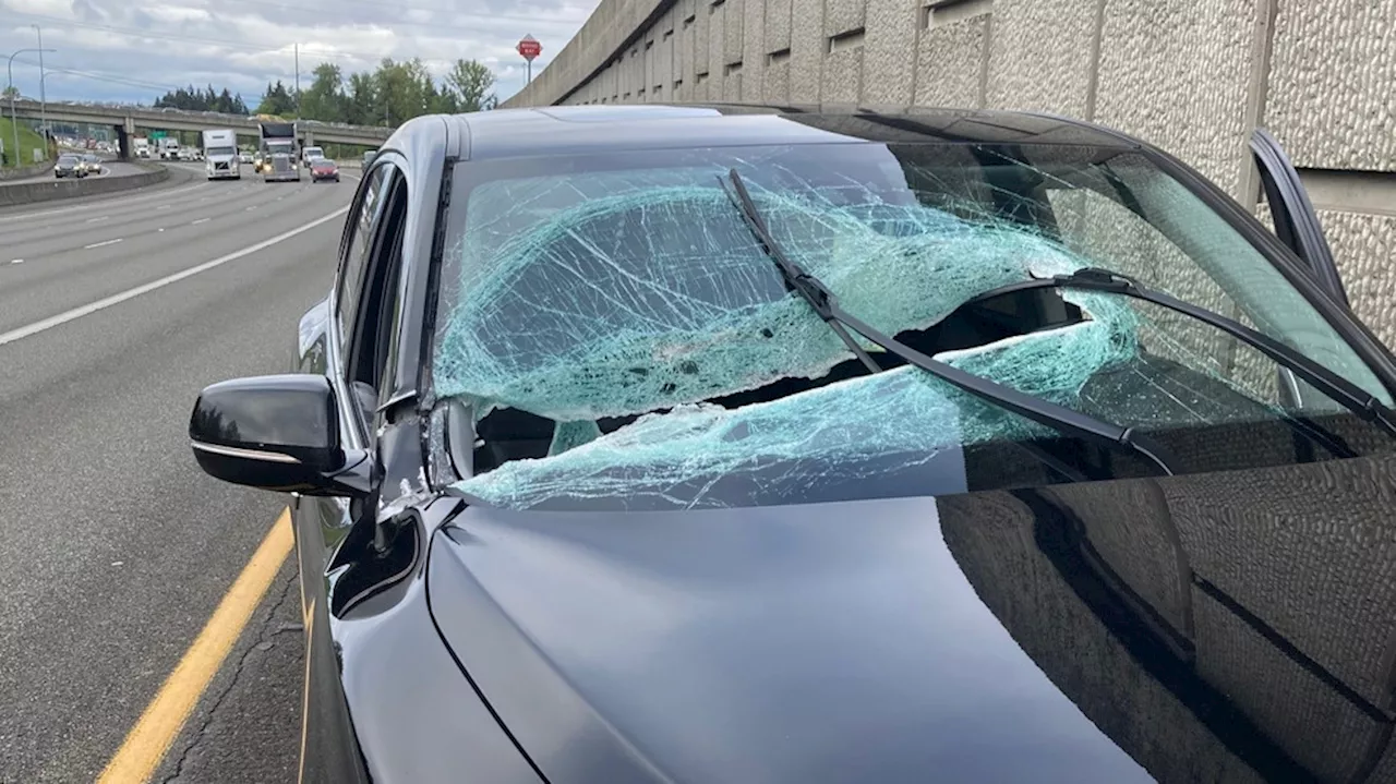 Steel beam thrown from overpass goes through windshield of car on I-5 in Lynnwood