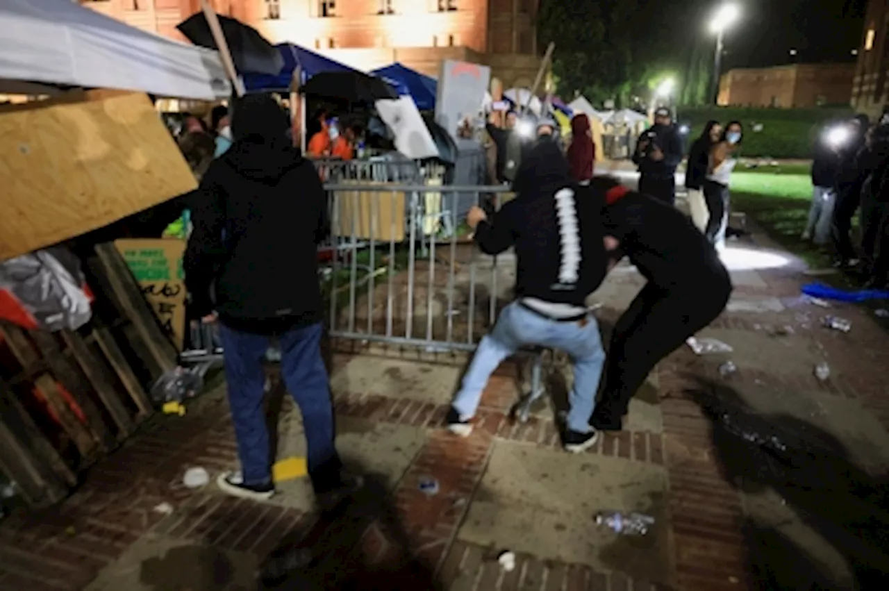 Clashes erupt on UCLA campus between pro-Palestinian and counter protesters UPDATE 1-Clashes erupt on UCLA campus between pro-Palestinian supporters and counter-protesters