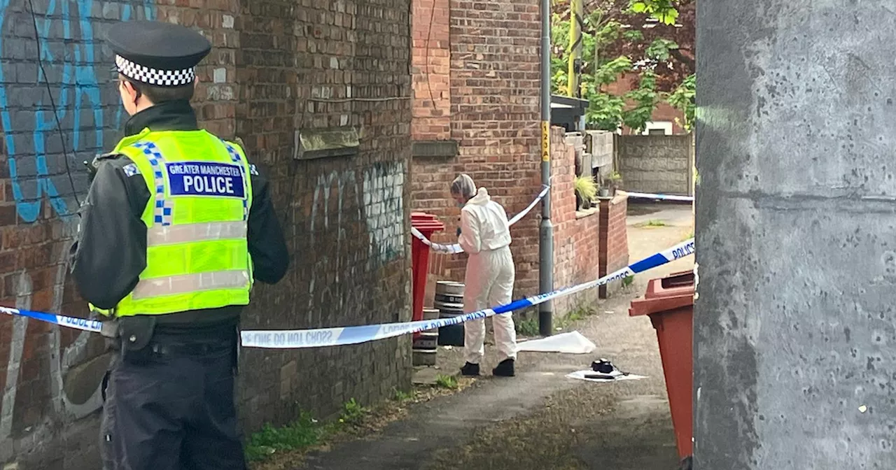 LIVE updates as police cordon off alleyway on major road with forensics on scene