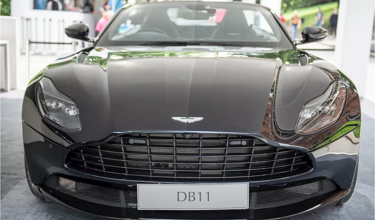 Aston Martin's losses nearly doubled on lower sales, but carmaker projects growth from new models