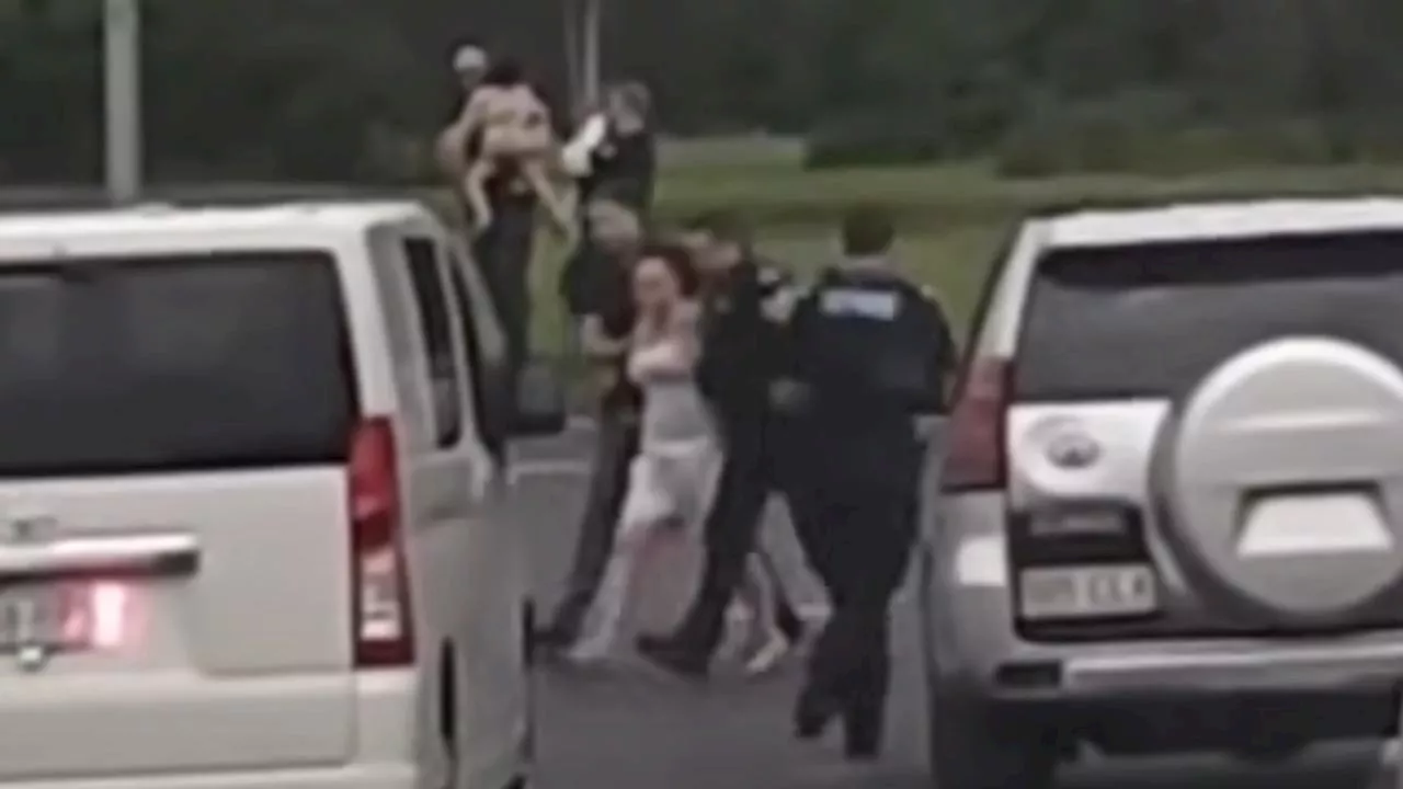 Woman goes on rampage with kids in car