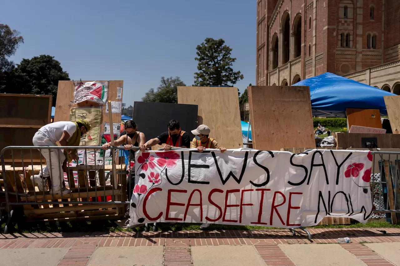 Pro-Palestinian and pro-Israeli demonstrators clash at UCLA, drawing police