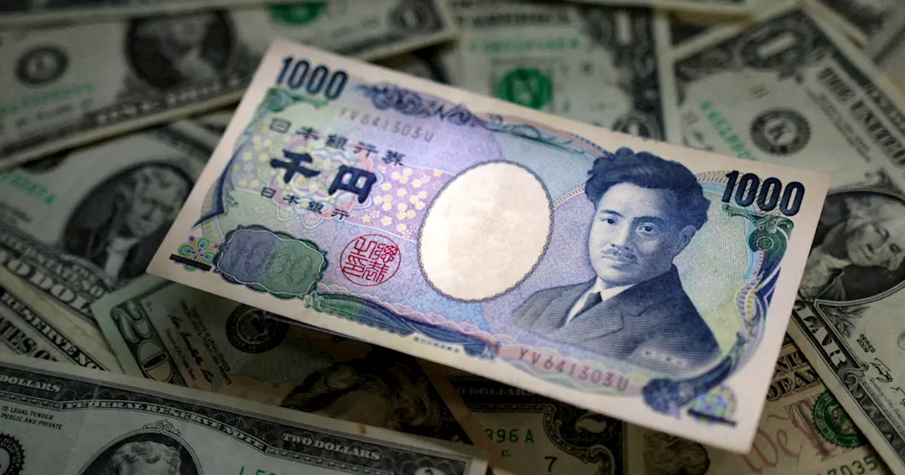 Dollar nears year high after pre-Fed data shock, yen slips