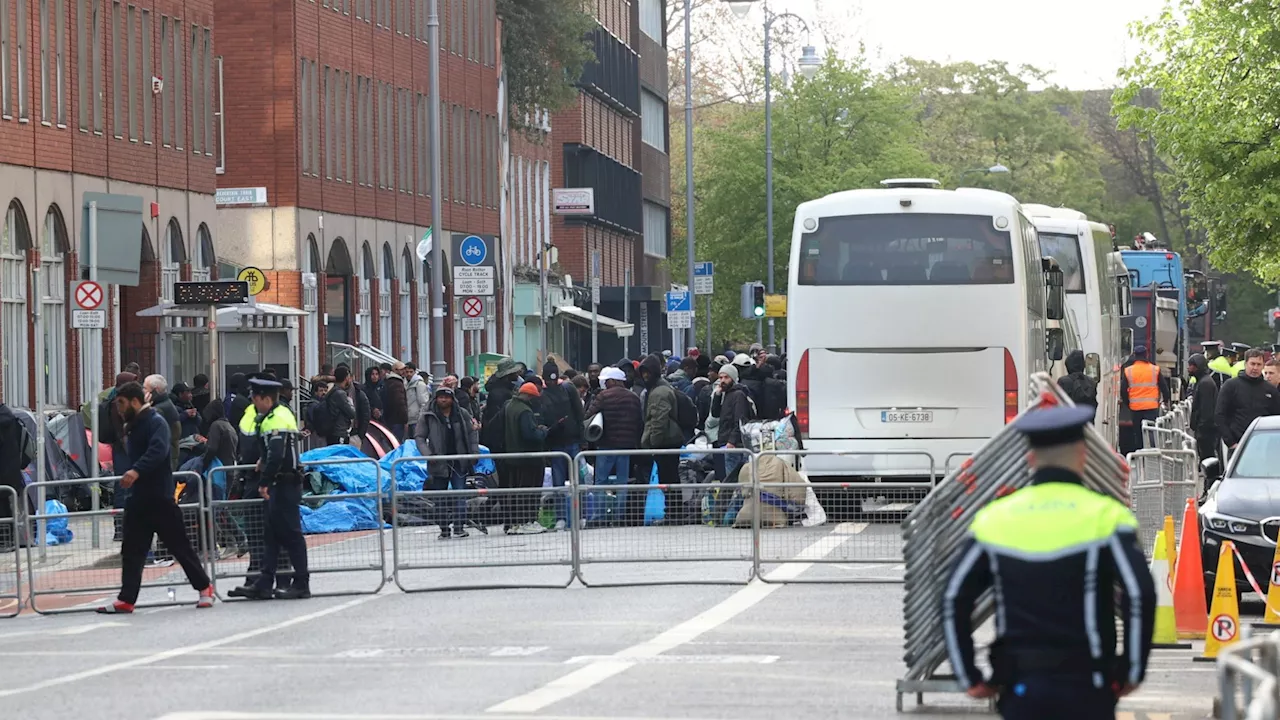 Dublin’s ‘tent city’ destroyed as major operation takes place to remove asylum seekers from busy street as...