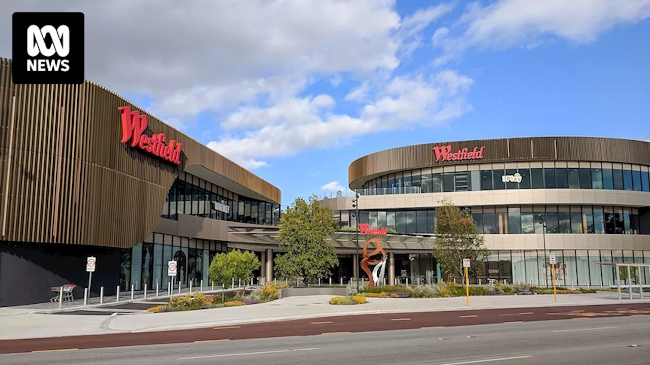 Police search for assailant after knife attack at Westfield Carousel shopping centre in Perth