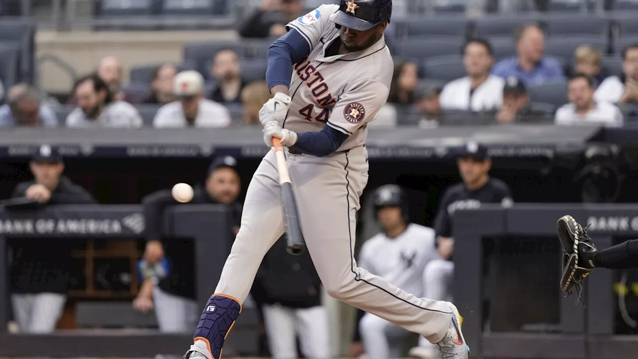 Alvarez and Singleton hit long homers in the 1st inning to help Astros avoid being swept by Yankees