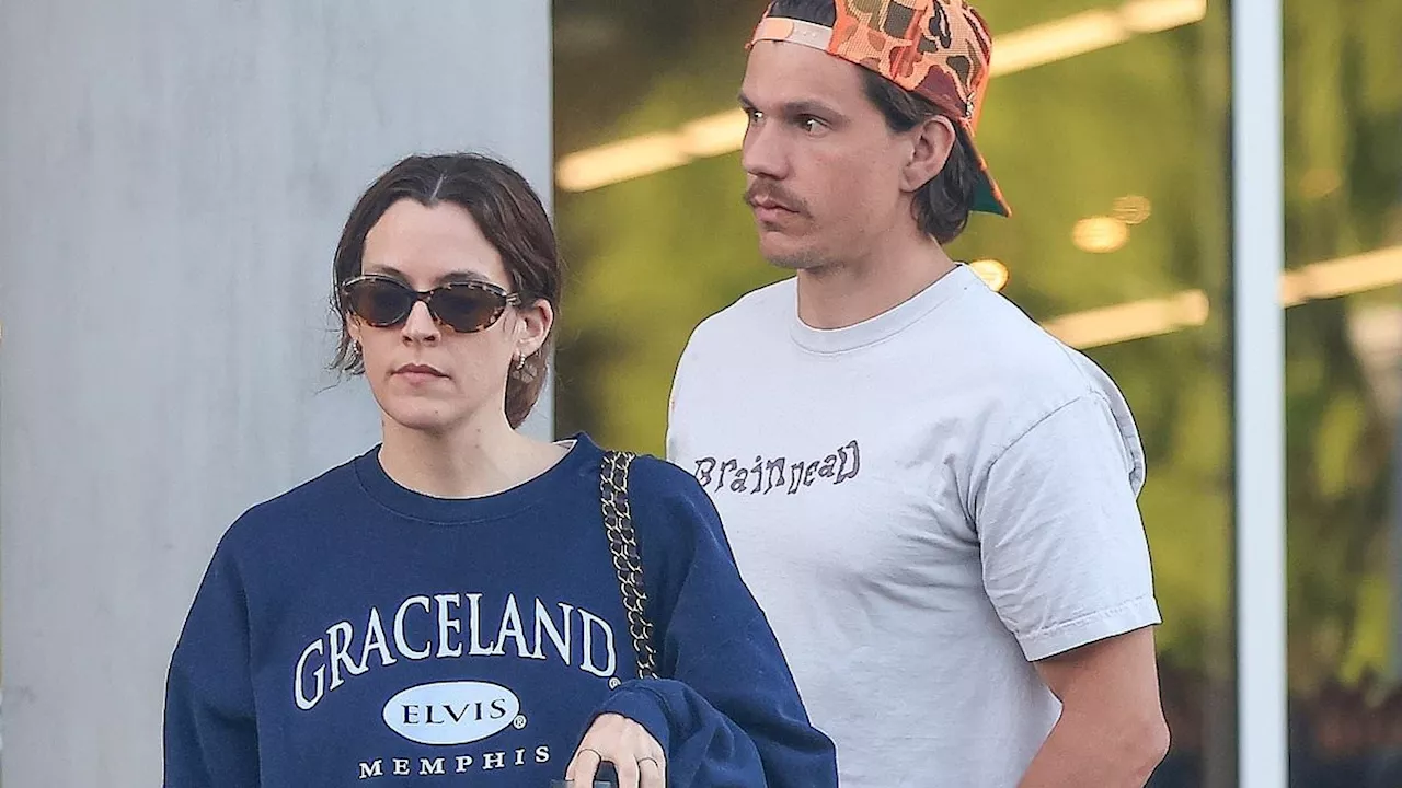 Riley Keough wears a sweatshirt from her grandfather Elvis Presley's estate Graceland while with her...