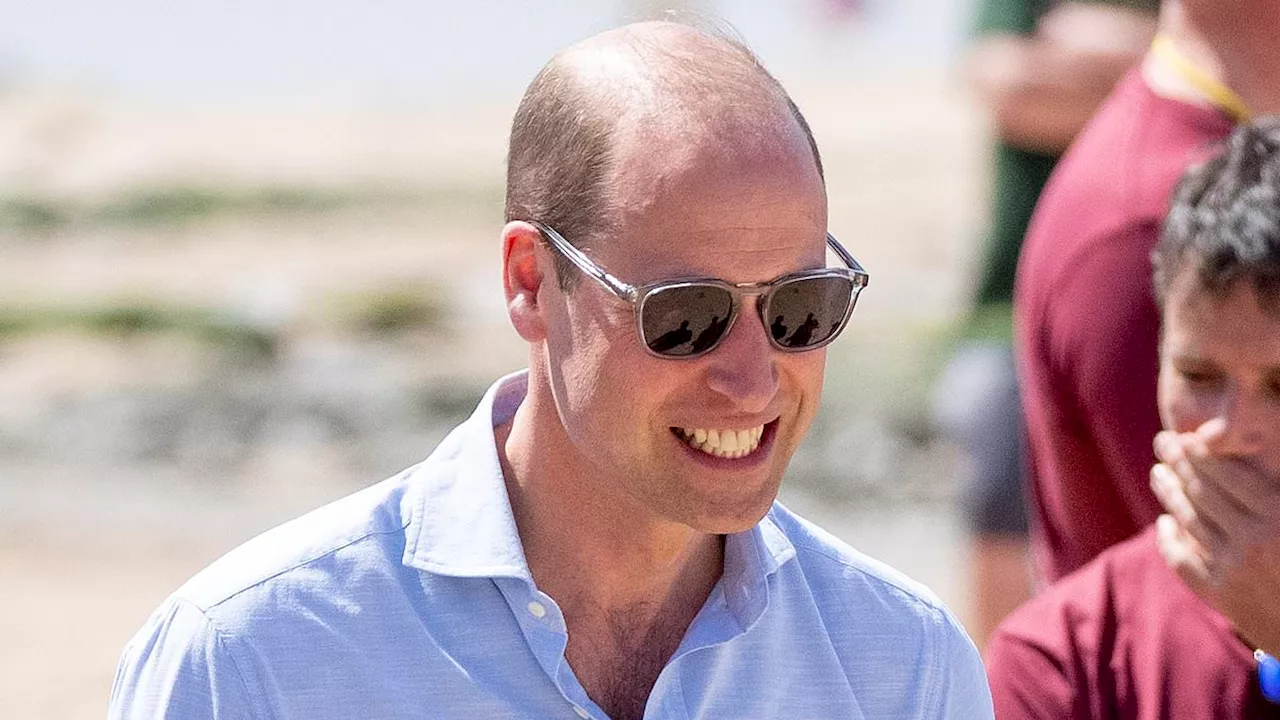 Prince William on Cornish surf beach playing volleyball