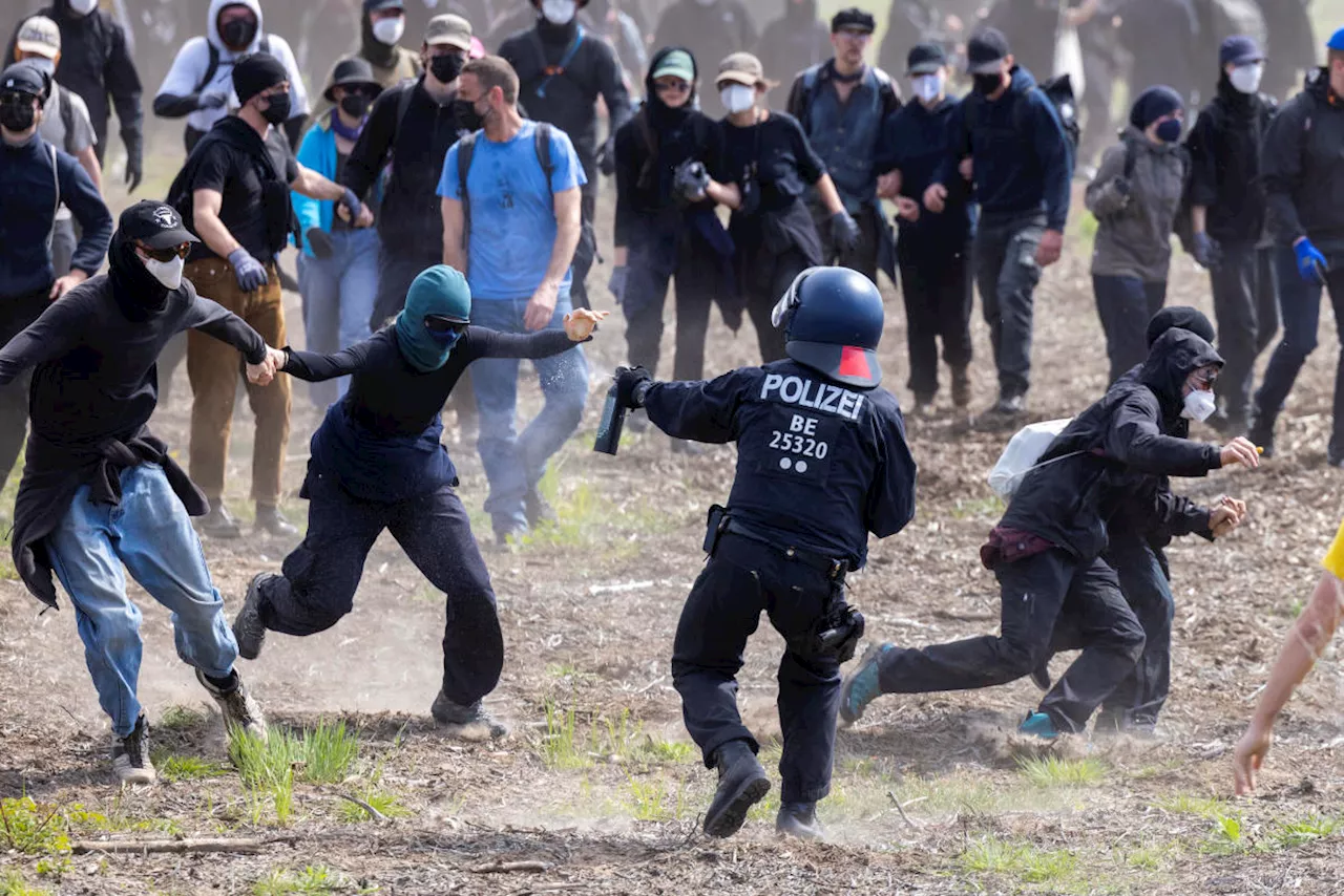 Climate protestors clash with police outside Tesla’s German gigafactory