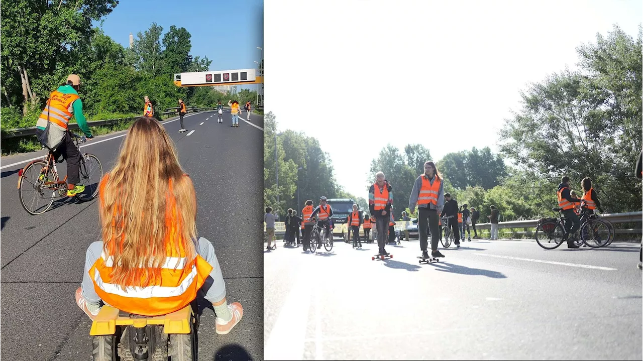 Klimakleber stürmen A4 mit Skateboard und Rollschuhen