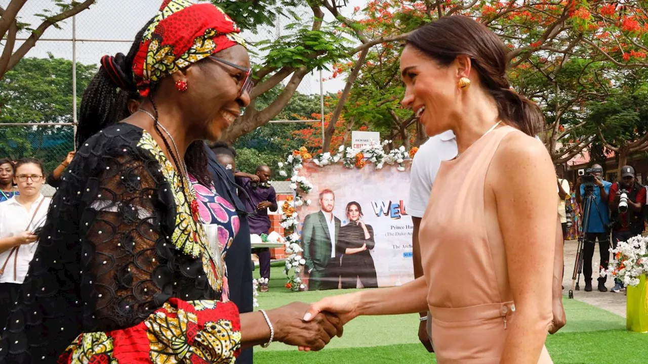 Meghan Markle Glows in a Sleeveless Peach Sundress for the First Day of Her Nigeria Visit