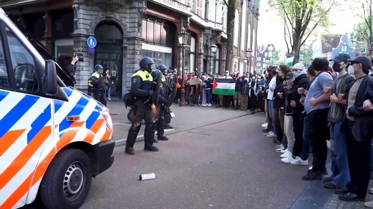 Pro-Palestinian student demonstrators clash with police in Amsterdam