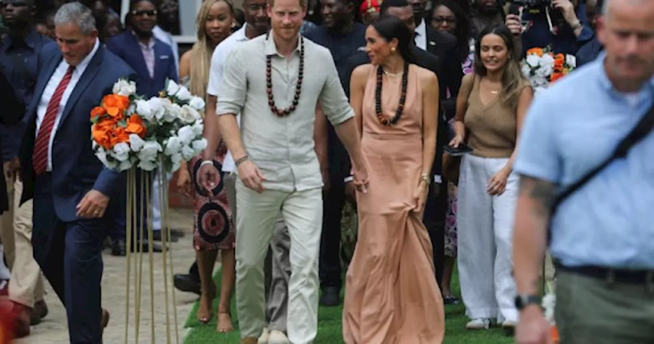 Prince Harry and Meghan, greeted with cheers, talk mental health in Nigeria