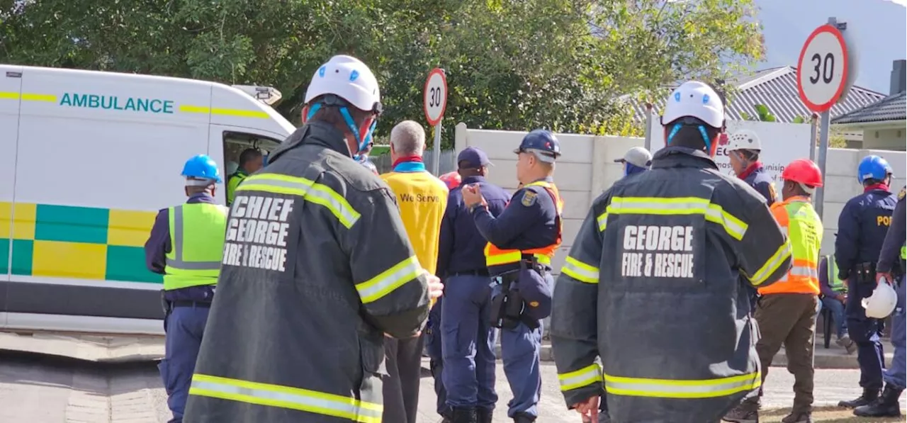 George worker freed after 118 hours under rubble