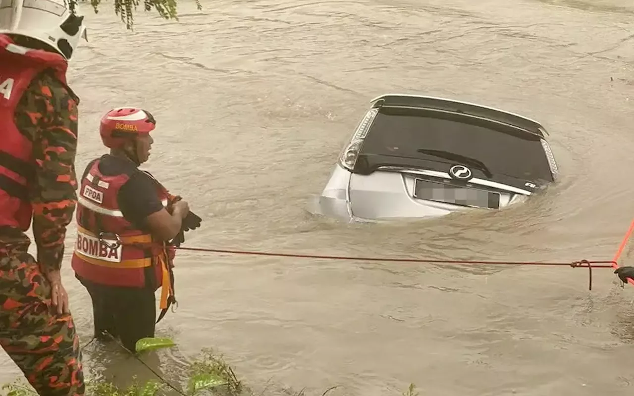 Woman dies after car plunges into Penang river