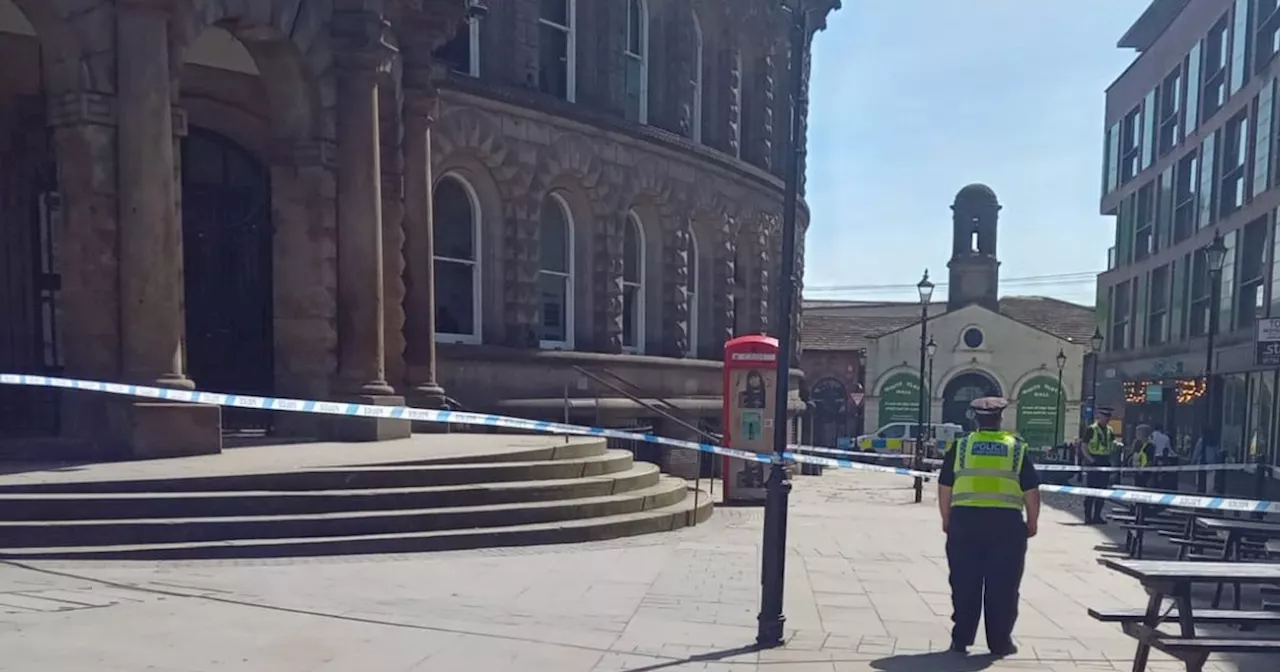 Police outside Leeds Corn Exchange live as large area taped off