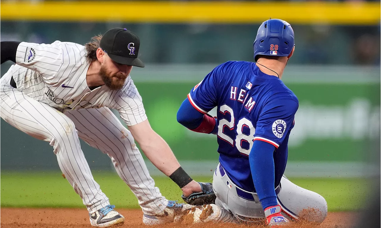 Charlie Blackmon's 2-run double in the 8th inning leads Rockies past Rangers 4-2