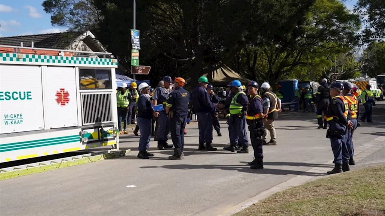 George building collapse: Tiler Gabriel Gambe freed from rubble, rushed to hospital