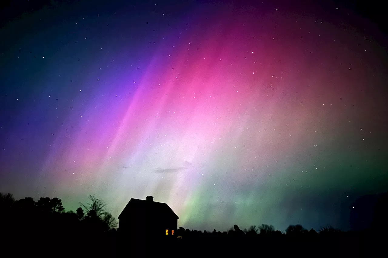 Strong solar storm produces rare northern light shows: photos