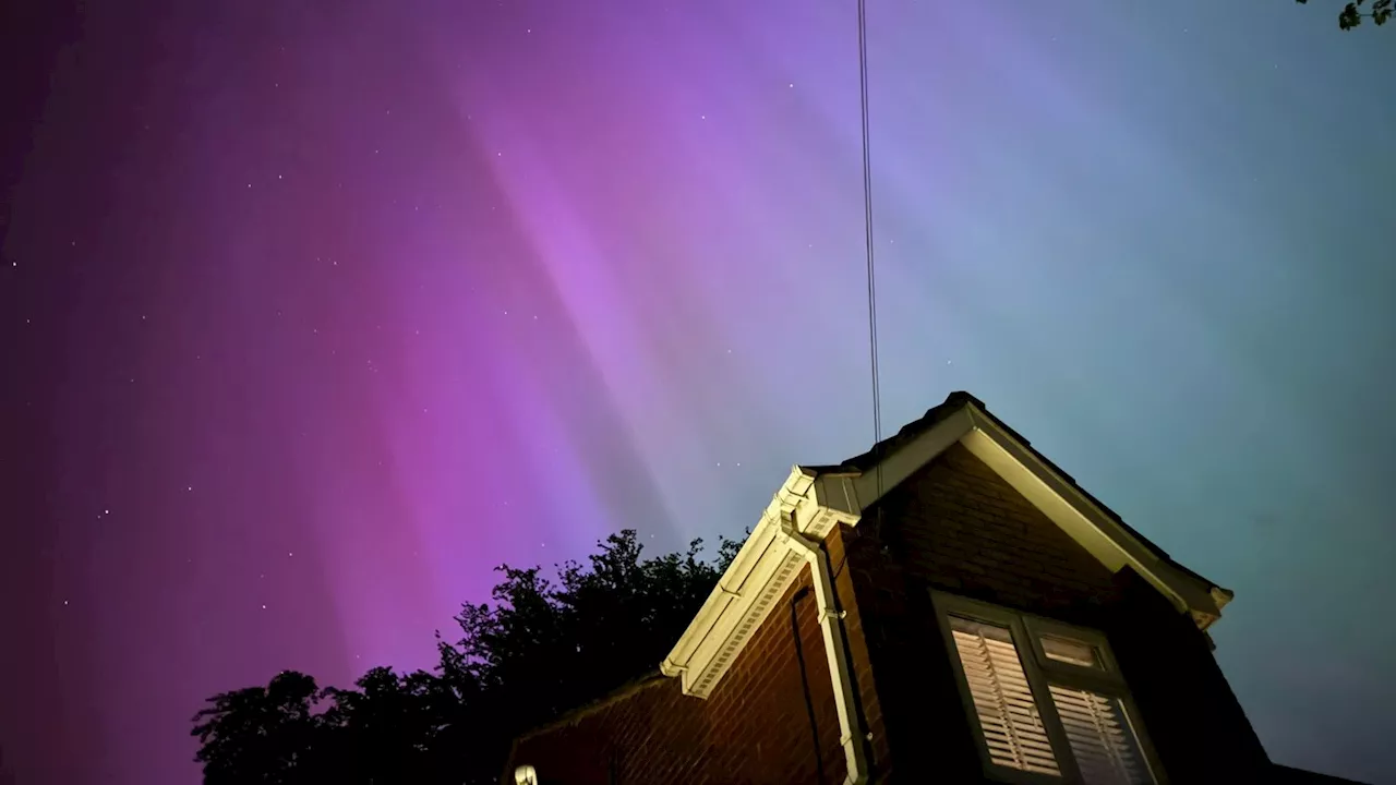 Northern Lights glow up skies across UK and around the world