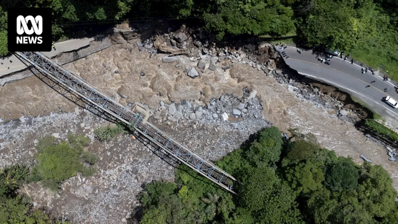 Cold lava mudslides kill dozens as flash floods hit Indonesian island of Sumatra