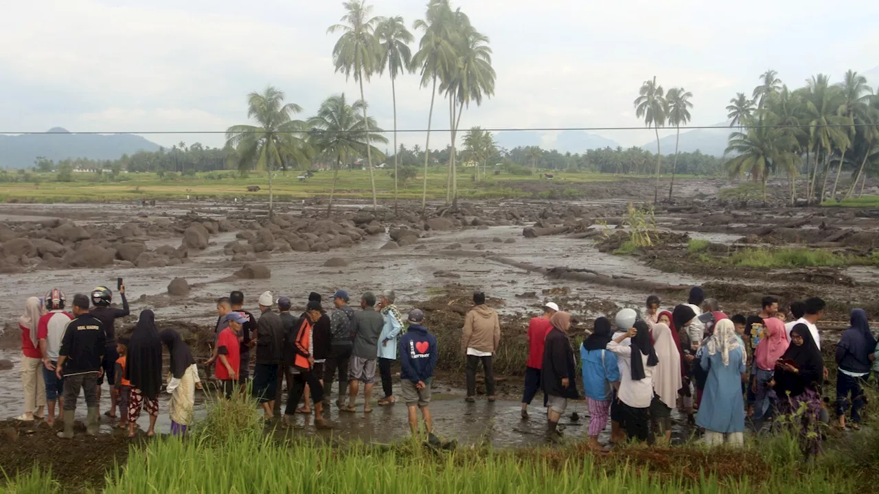 Flash floods and cold lava flow hit Indonesia’s Sumatra island, killing at least 15 people