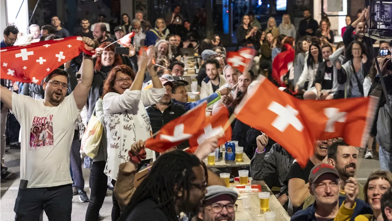 Swiss fans get ready to welcome Eurovision winner Nemo back home