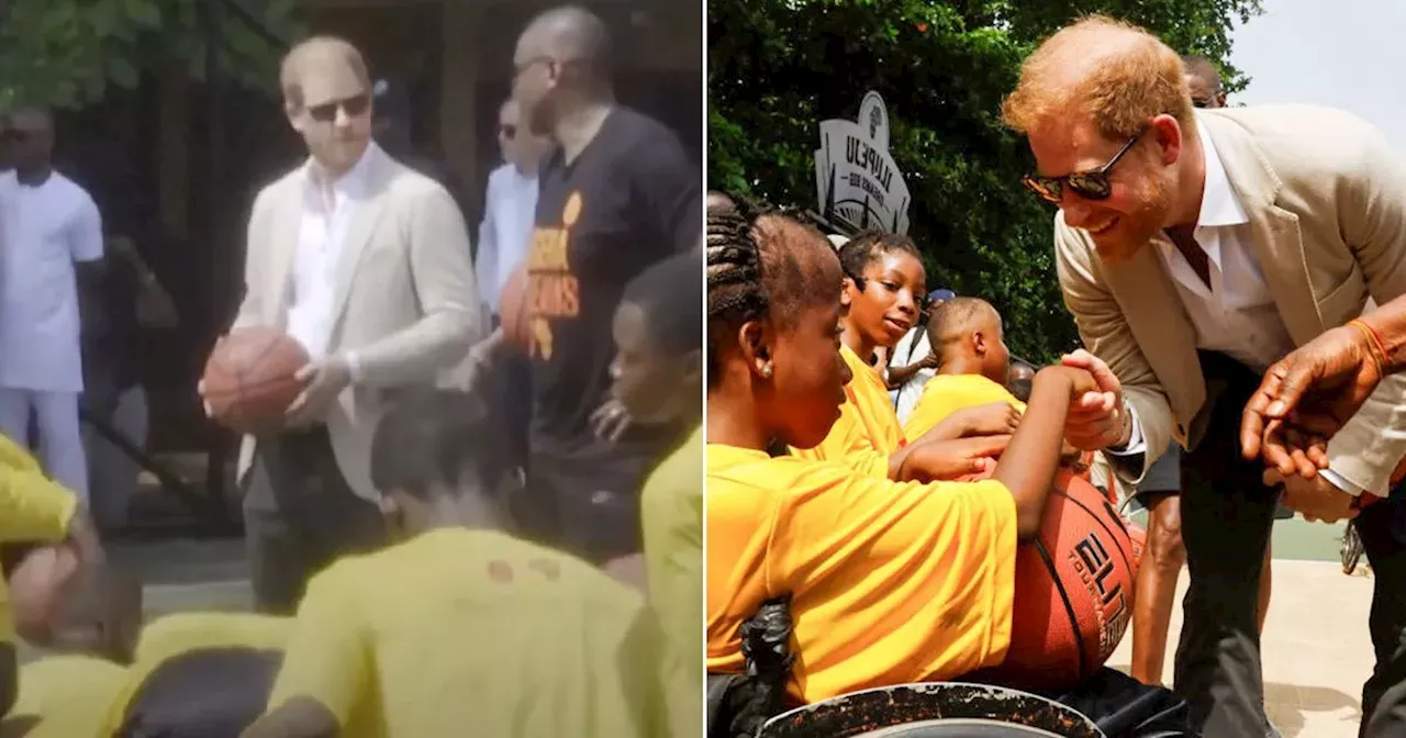 Prince Harry shows off basketball skills to crowd of kids on last day in Nigeria