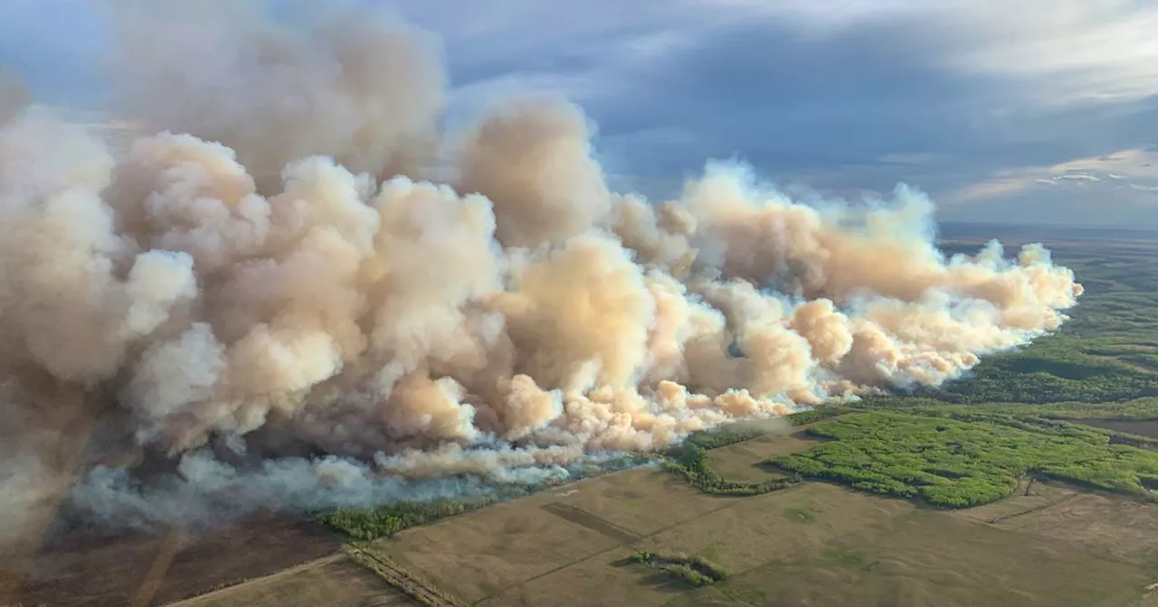 Spreading Western Canada blaze forces evacuations, smoke causes air quality concerns