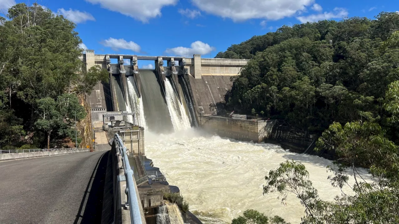 Major dam overflows following heavy rain and severe weather