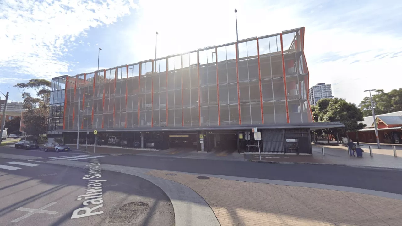 Man arrested after body discovered in a carpark stairwell in Wollongong