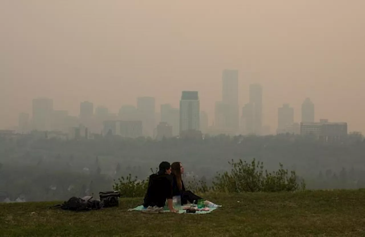 Wildfires rage on across Western Canada as B.C. town braces for return of high winds